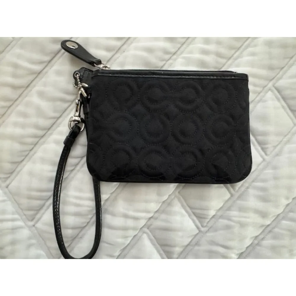 Coach Quilted wristlet, black.